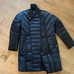 Navy and black wearable puffer from madewell with side zipper detail